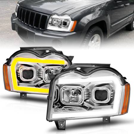 ANZO Headlights, Tail Lights and More  - ANZO 05-07 Jeep Grand Cherokee Projector Headlights - w/ Light Bar Switchback Chrome Housing