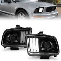 ANZO Headlights, Tail Lights and More  - ANZO 05-09 Ford Mustang (w/Factory Halogen HL Only) Projector Headlights w/Light Bar Black Housing - Image 1